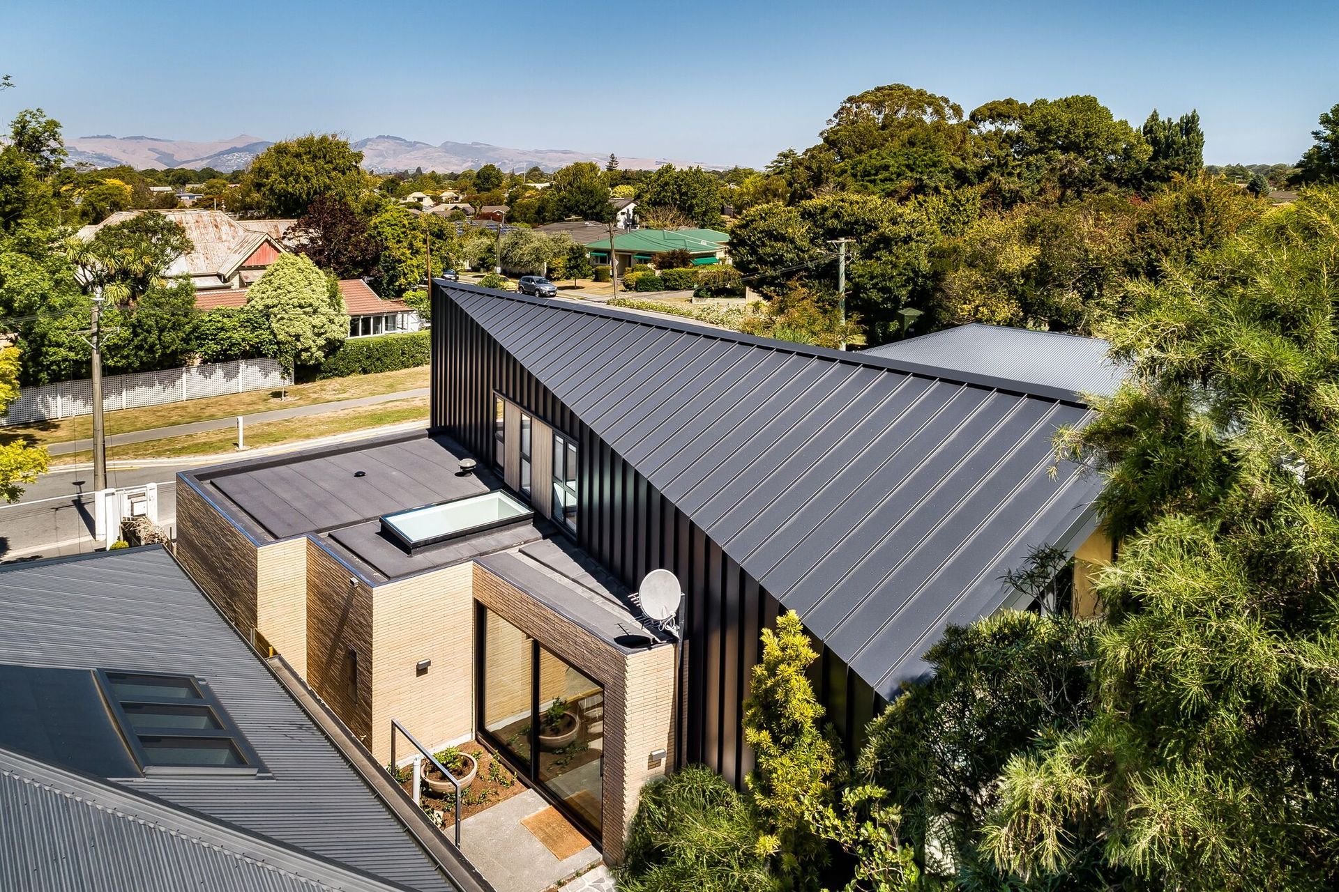 The placement of windows ensures a light-filled interior at Hawthorn Street House, Christchurch, by Sheppard &amp; Rout Architects.