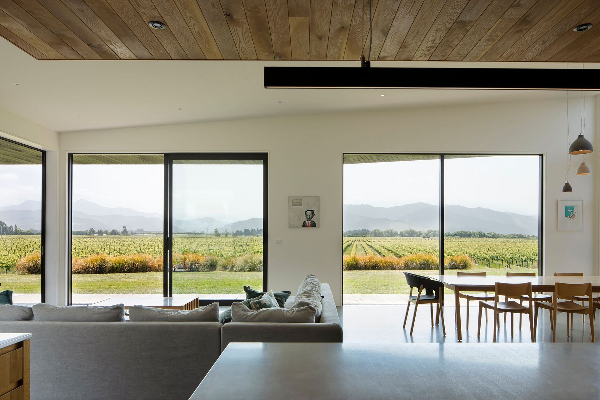 The living area of Vineyard House faces the grape vines and the afternoon sun.