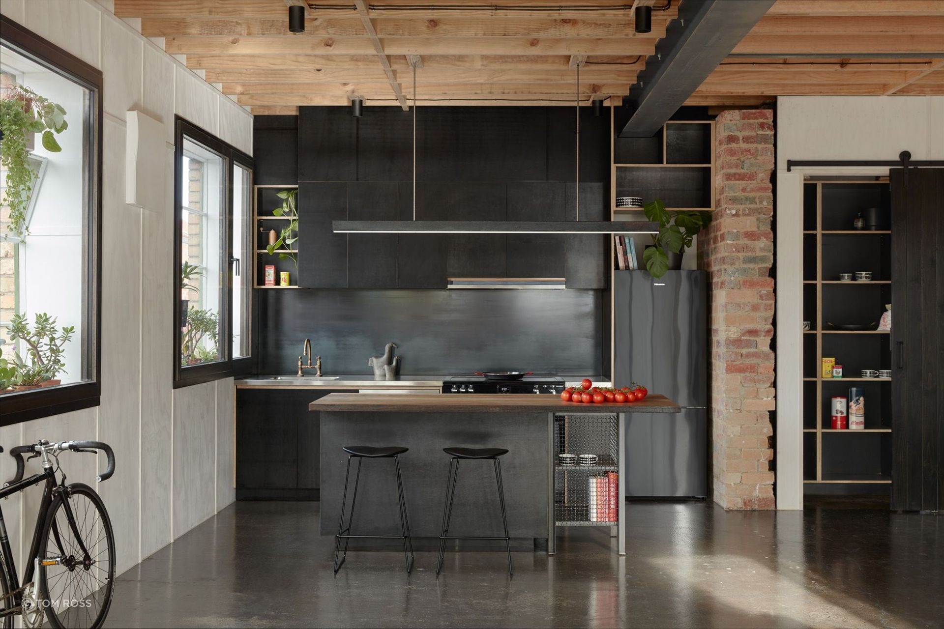 Great care was taken to retain the embodied energy of the structure, celebrating its original form and integrating this into a series of new, functional spaces for a growing family unit. 