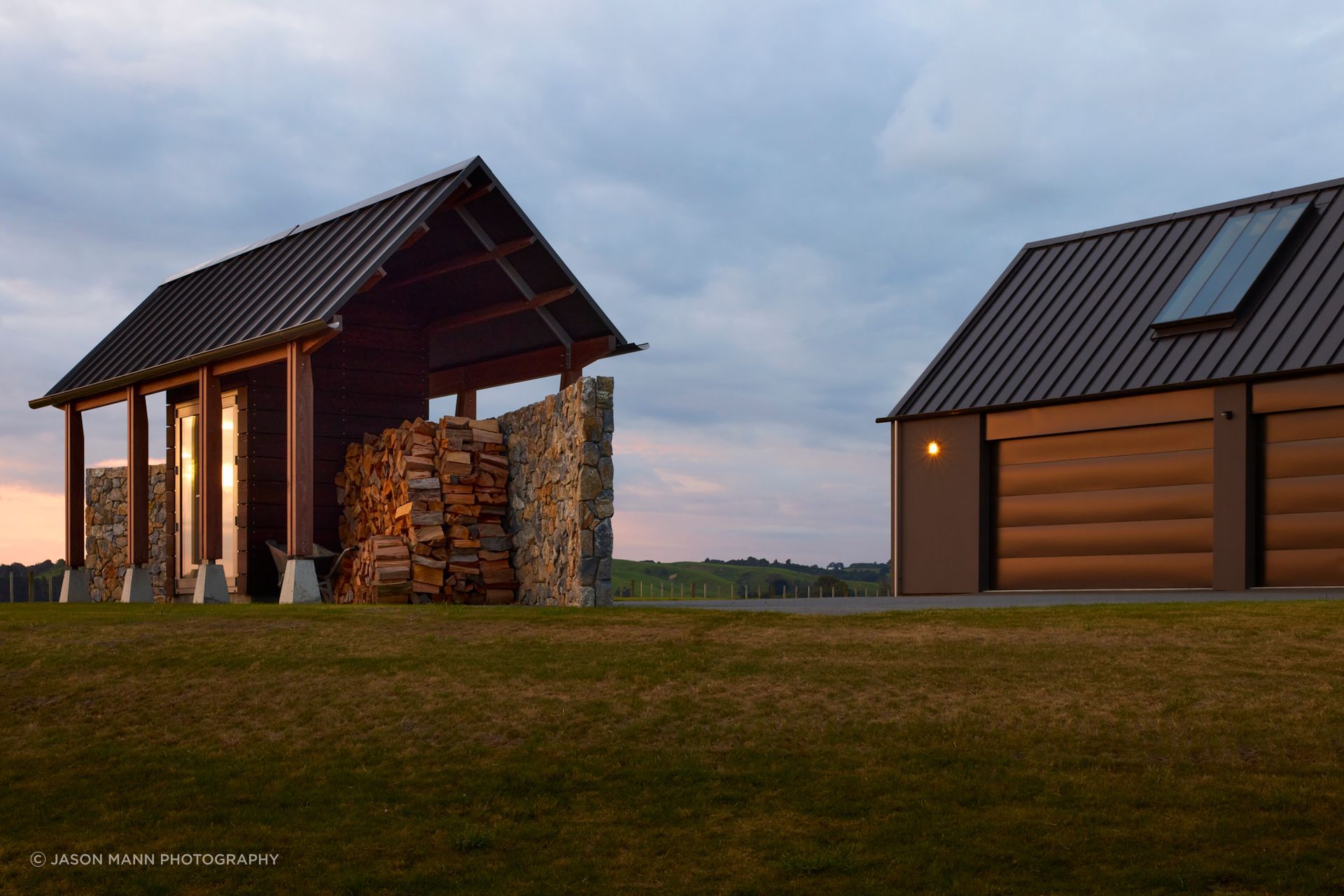 The woodshed doubles as a visual break, so that the utility sheds on the farm can't be seen from the living spaces.