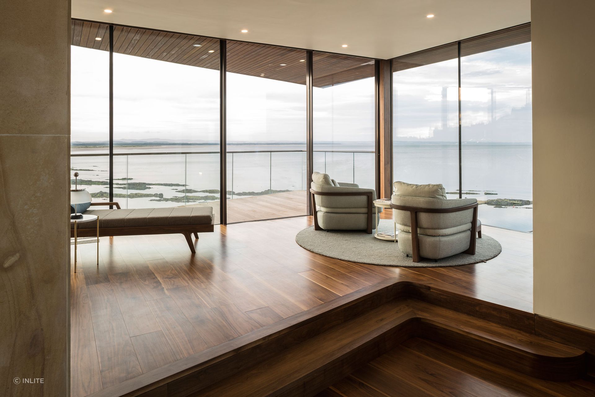 Recessed light options like the Diro SBL by Delta Light delicately create a welcoming atmosphere