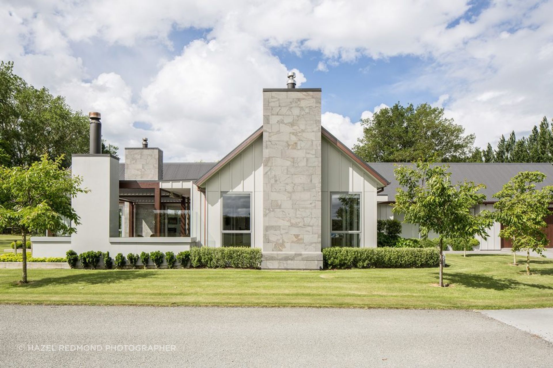 Longbeach House features a lightweight bluestone cladding on the chimney, celebrating the gorgeous natural veining.