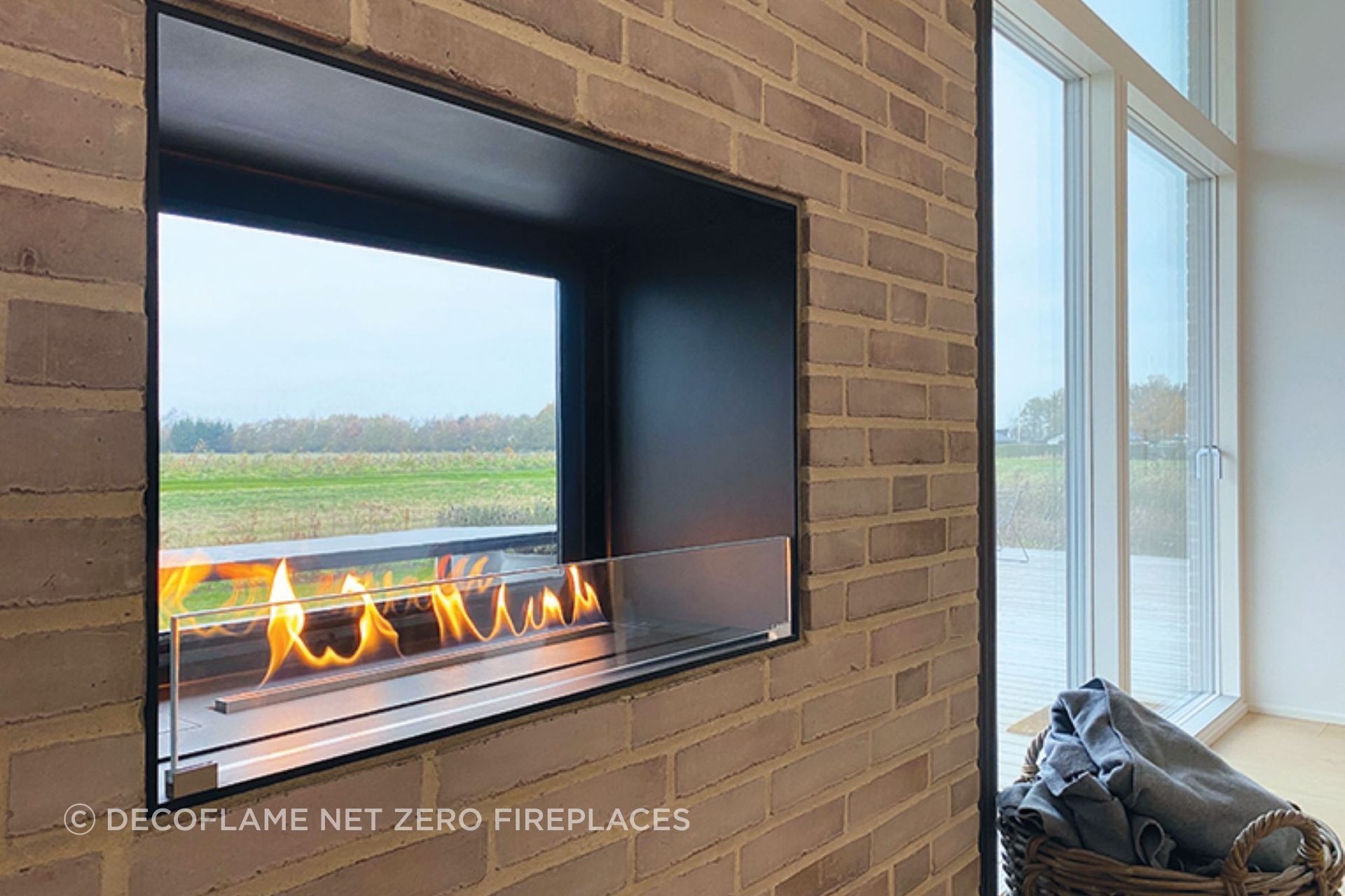 Ideal for making bold design statements, this BEV fireplace from DecoFlame Net Zero Fireplaces showcases a contemporary look.
