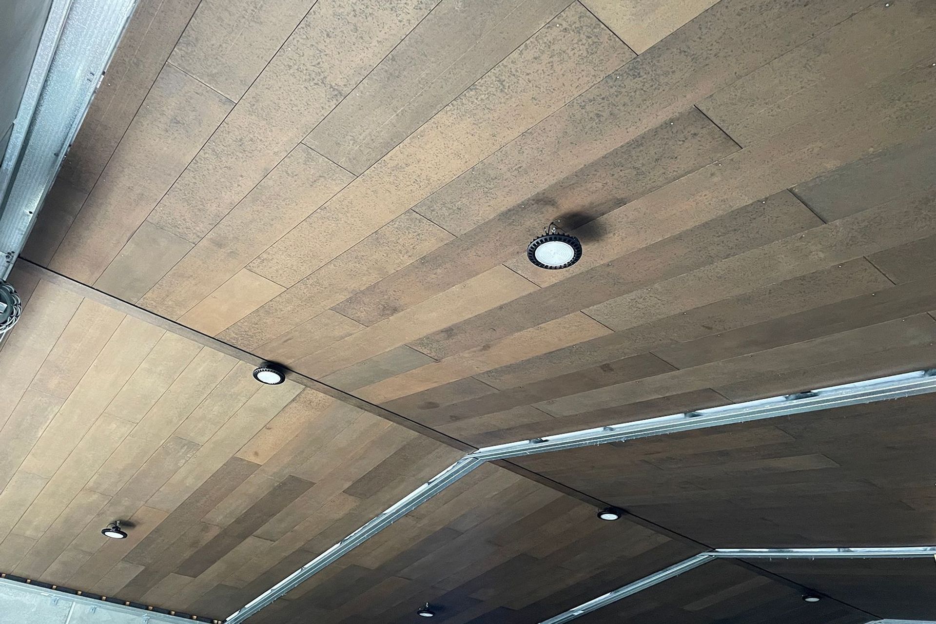 This shed ceiling Triboard TGV lining was stained with WOCA oils, giving it a leather look.