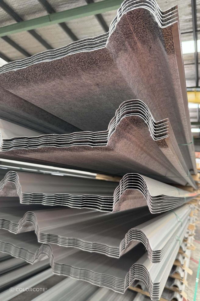 Roll formed long run roofing with where you can see the melt back on FleeceCote.
