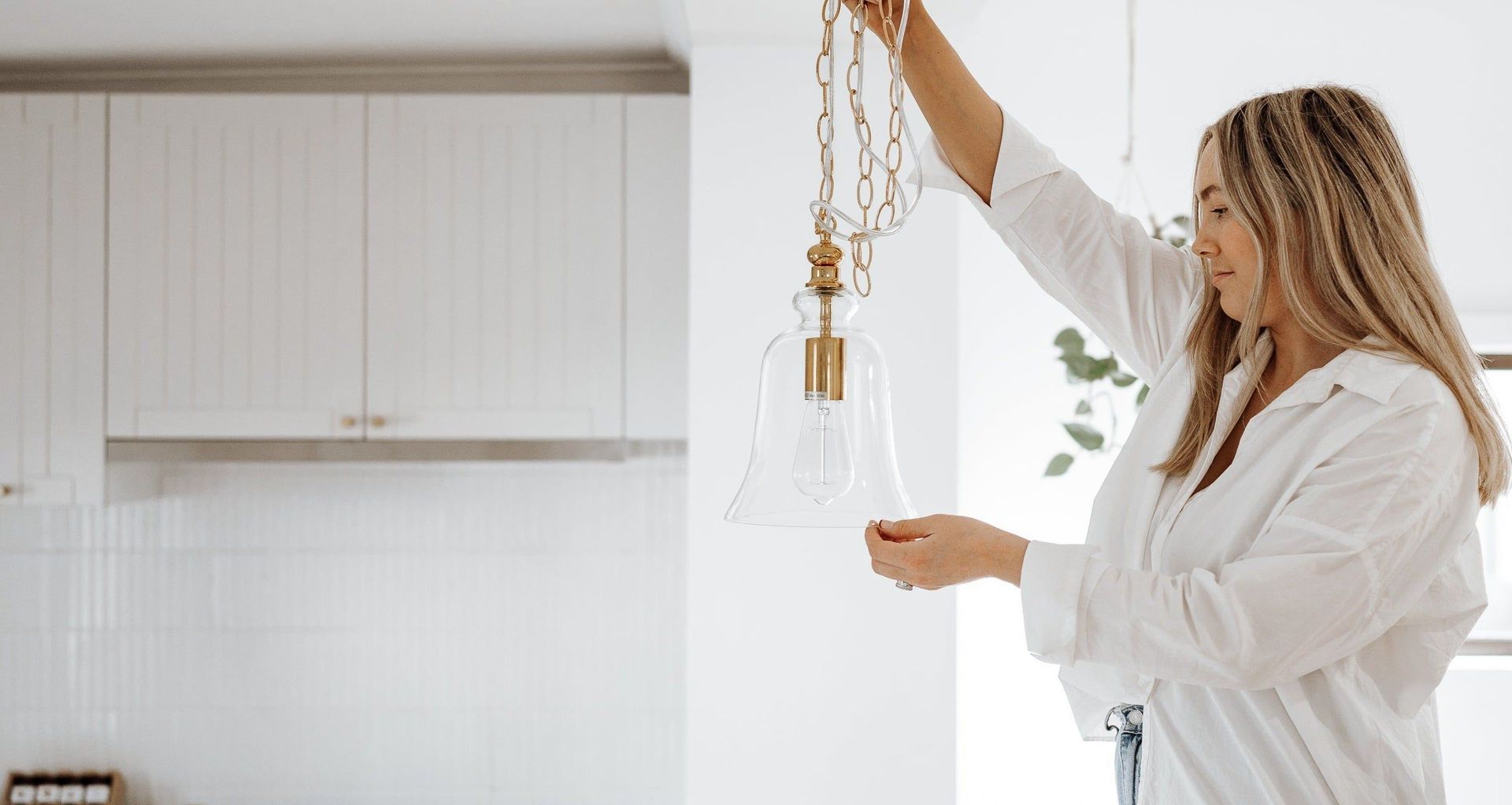 Tasmanian brand Ivory &amp; Deene's Gracie glass bell-shaped pendant.