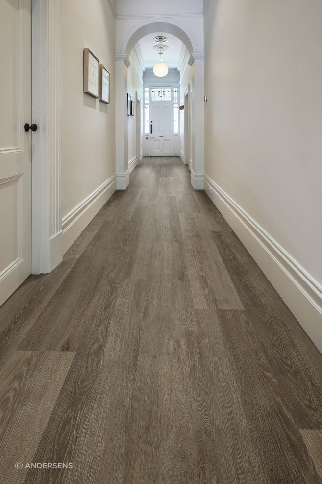 A traditional character hallway gets a slick new flooring update with vinyl longboard flooring.