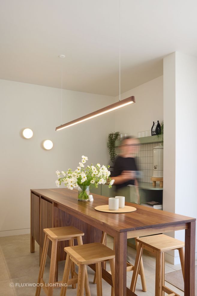 Tenn Pendant offers refined timber expression with architectural clarity.