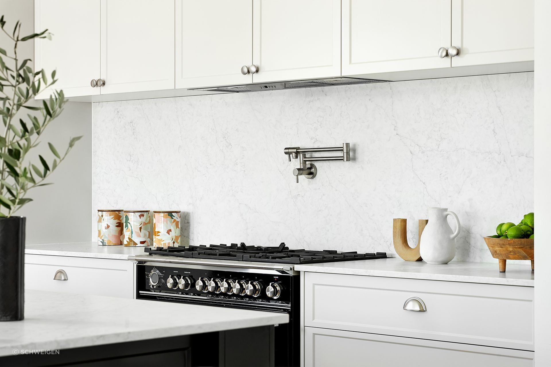Kitchen by Thomasz Group, featuring the 
UM1170-9S Silent Undermount Rangehood