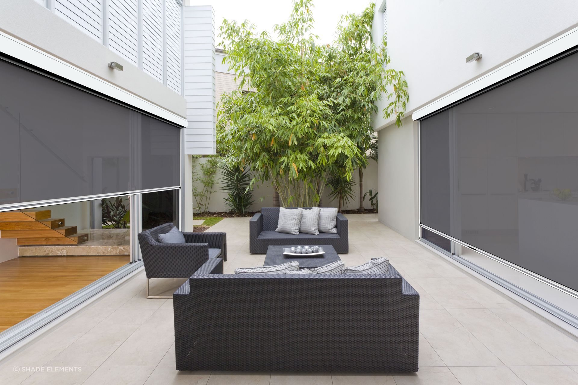 Outdoor shade with effortless sophistication with Ziptrak.