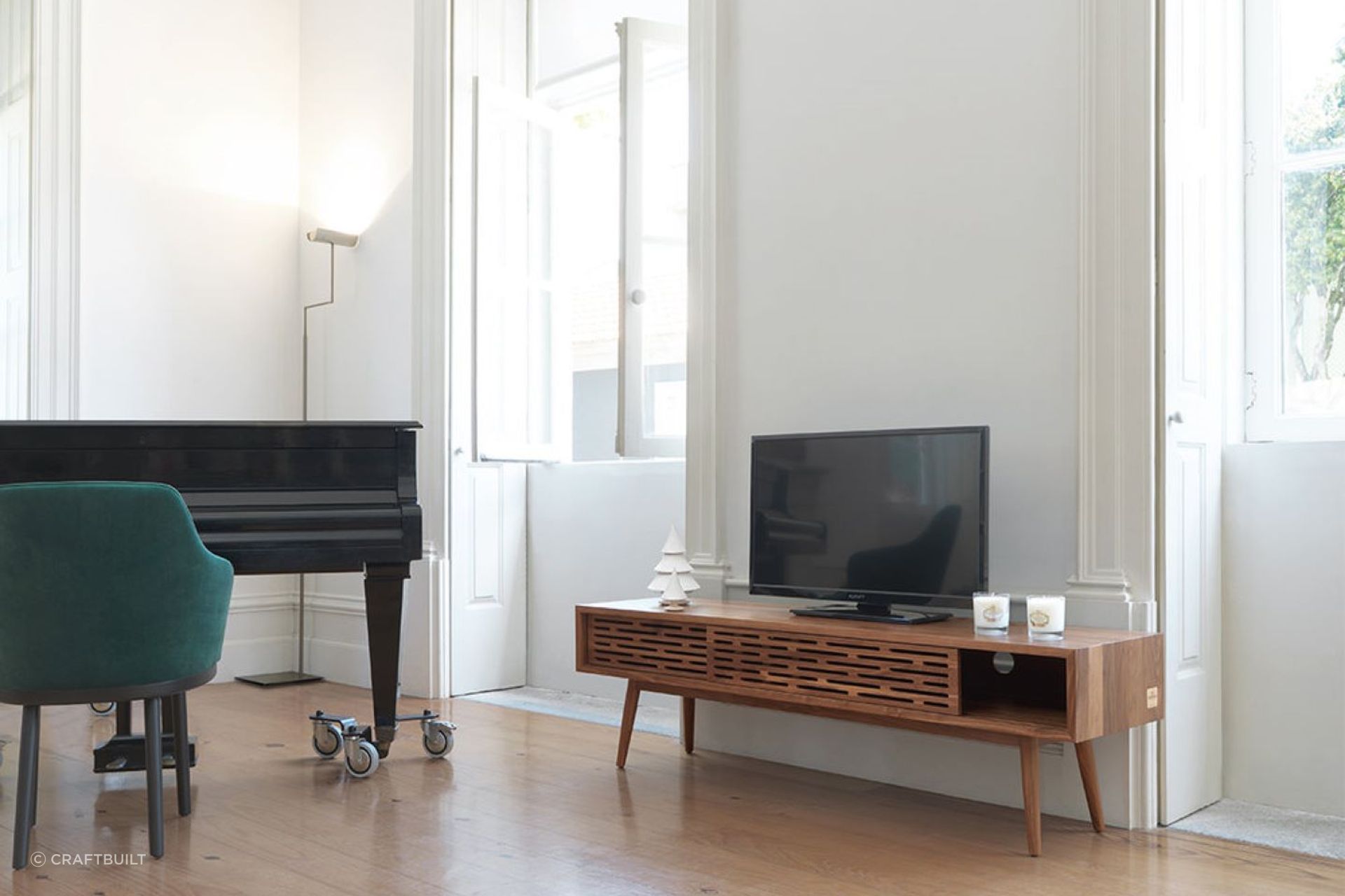 The visually elegant perforated sliding doors of the ALF Italia Novecento TV Cabinet are a great design feature.