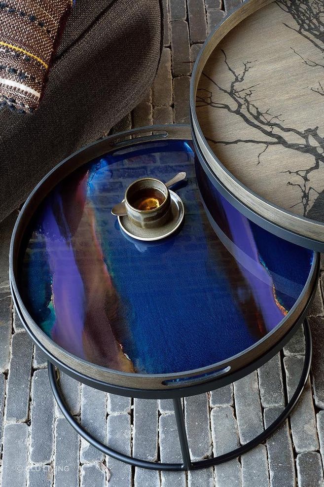 The raised edges on tray coffee tables help ensure items and valuables stay in place.