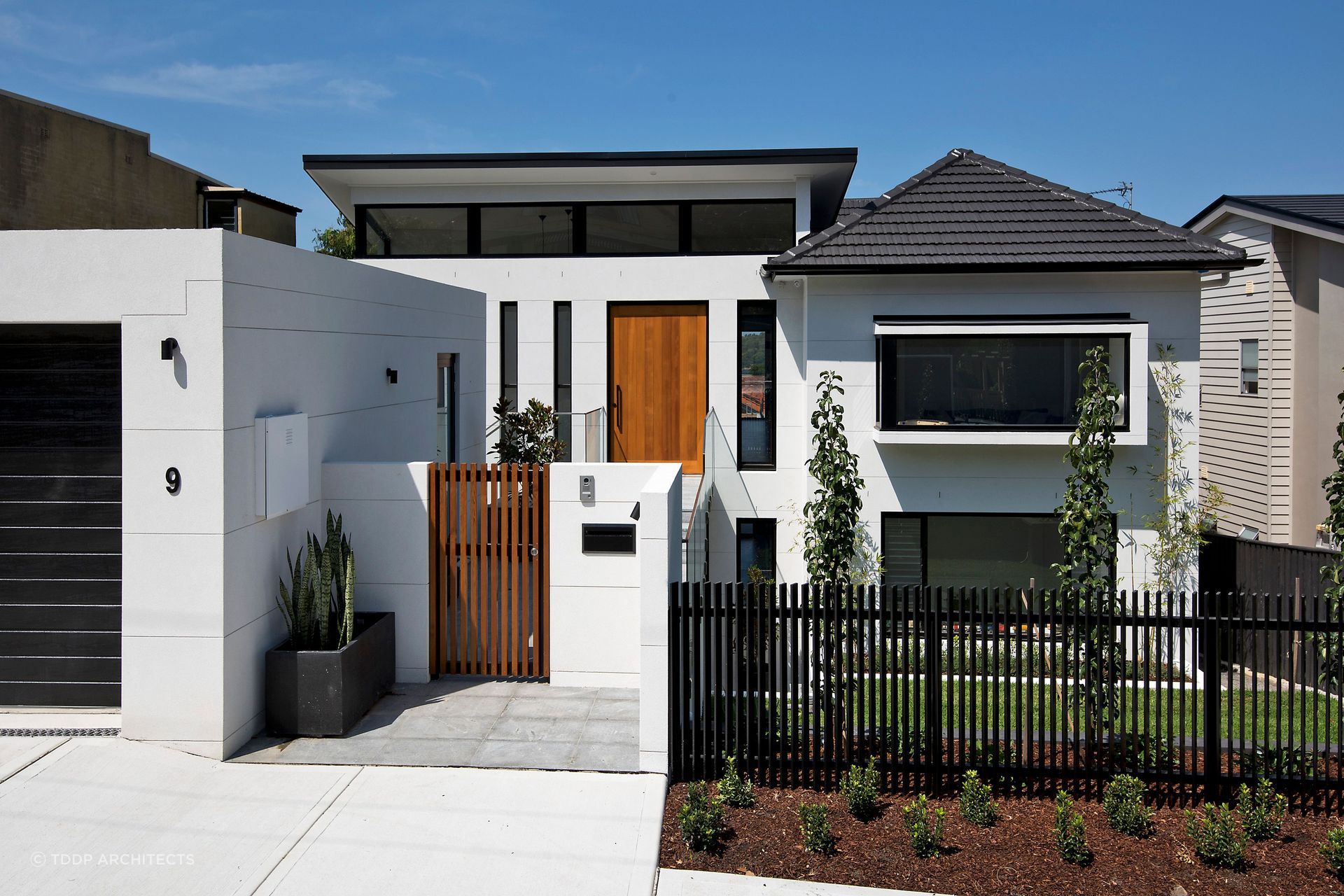 A stylish front gate helps keep your home safe, while increasing its kerb appeal. Featured project: 9L by TDDP Architects