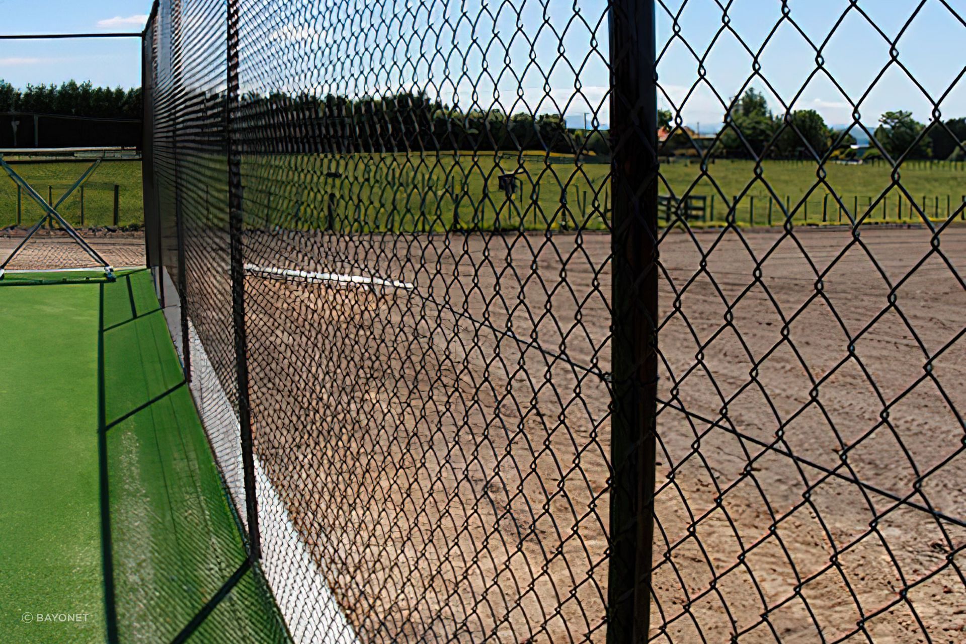Functional but highly effective, there are plenty of applications for chain link fencing, seen here featuring Bayonet Chain Link Netting.