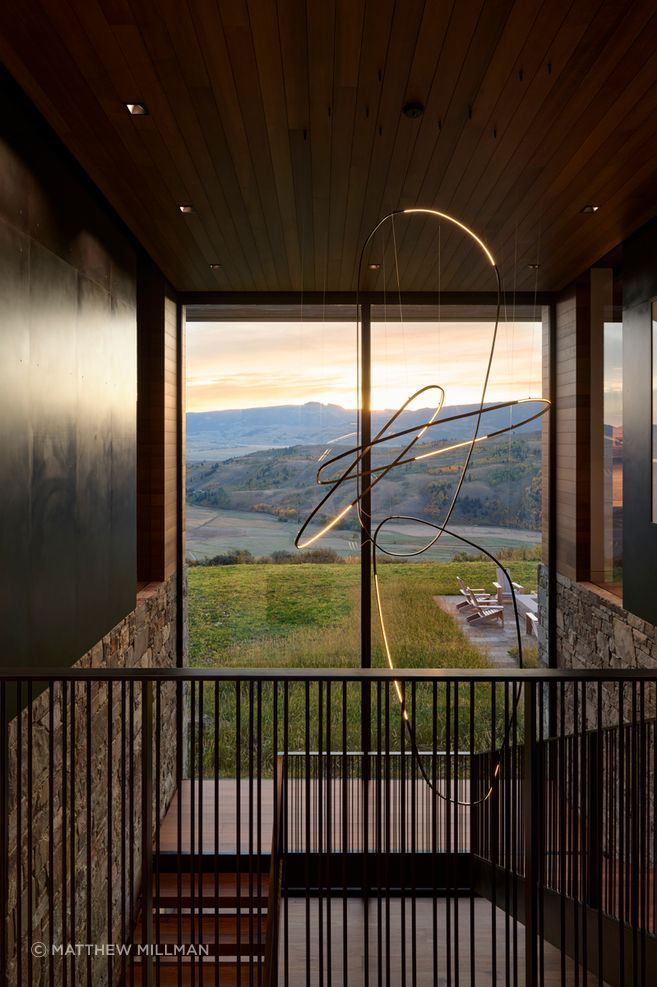 At Skyview, stone, timber and blackened steel frame the transition between interior and landscape, giving the home a material language that feels grounded, tactile and deeply connected to its mountain setting.
Architecture: CLB Architects