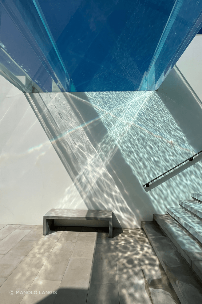 Acrylic pools also allow light to travel through water before it reaches the architecture, creating shifting patterns that make walls, floors and circulation spaces feel alive throughout the day.
