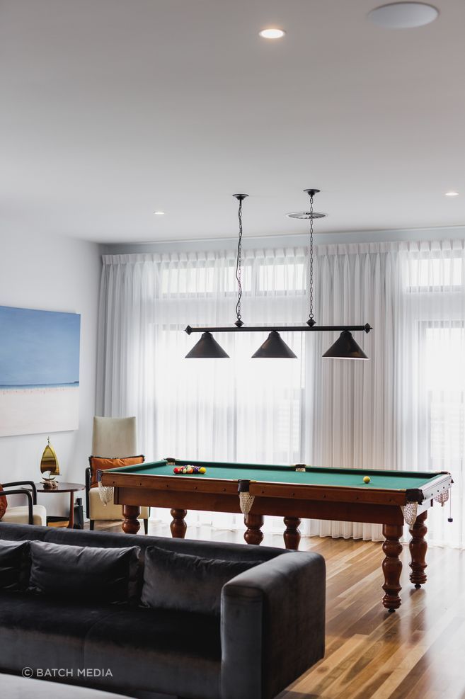 This games room by Black Lines Concept brings together the clients'  love of music and game playing.