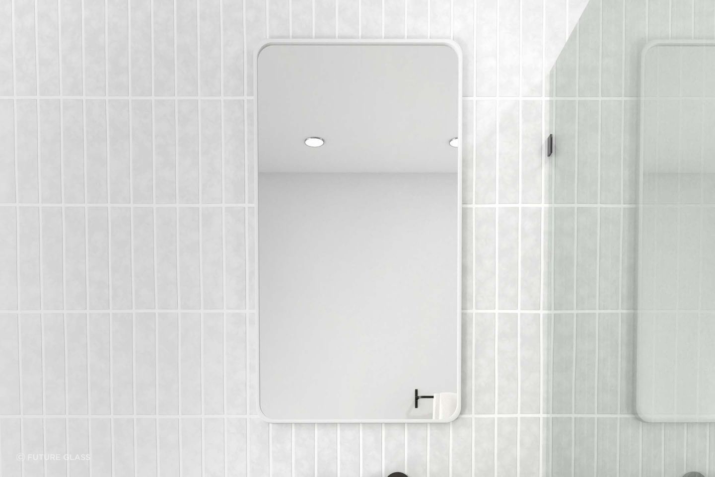 A rectangular bathroom mirror enhances a bathroom with its simplistic yet timeless charm. Featured product: Radius Rectangle Mirror.