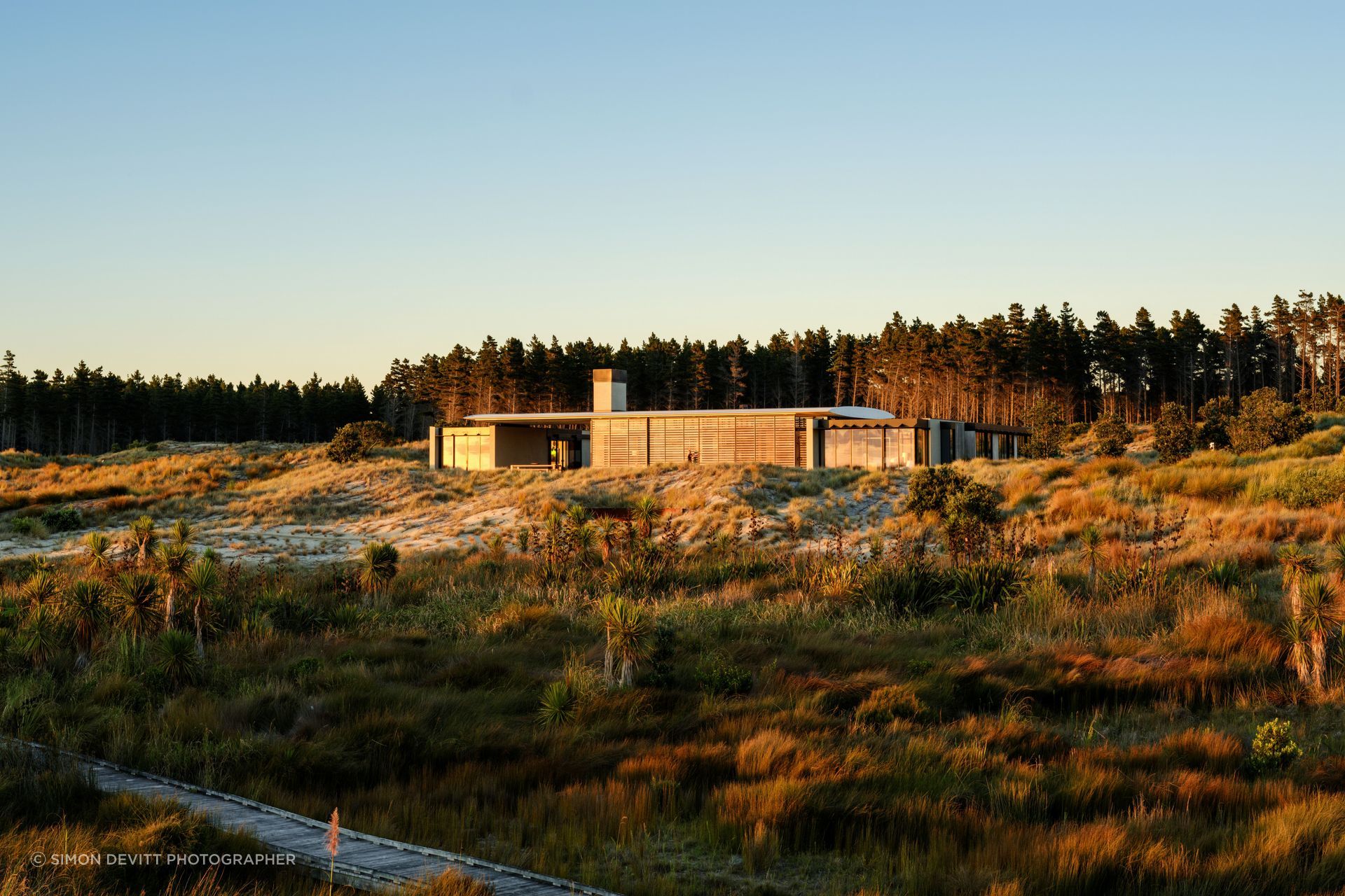 Te Whare Tupu Kirikiri at Tara iti by Olson Kundig Architects.