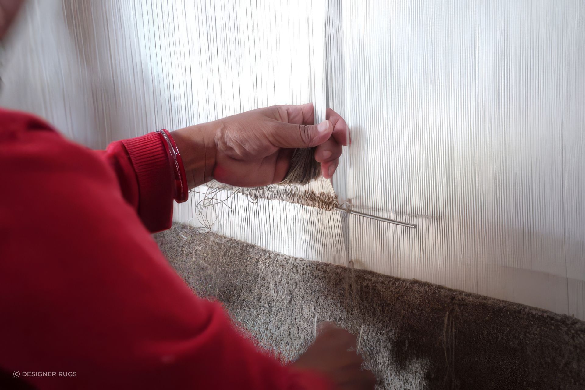 Handknotted-853x480-upscaled-by-Replicate.jpg