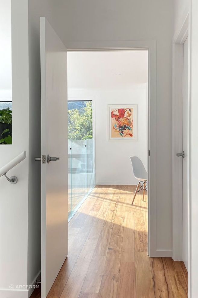 Rimu floors were chosen to soften the starkness of the white interior.