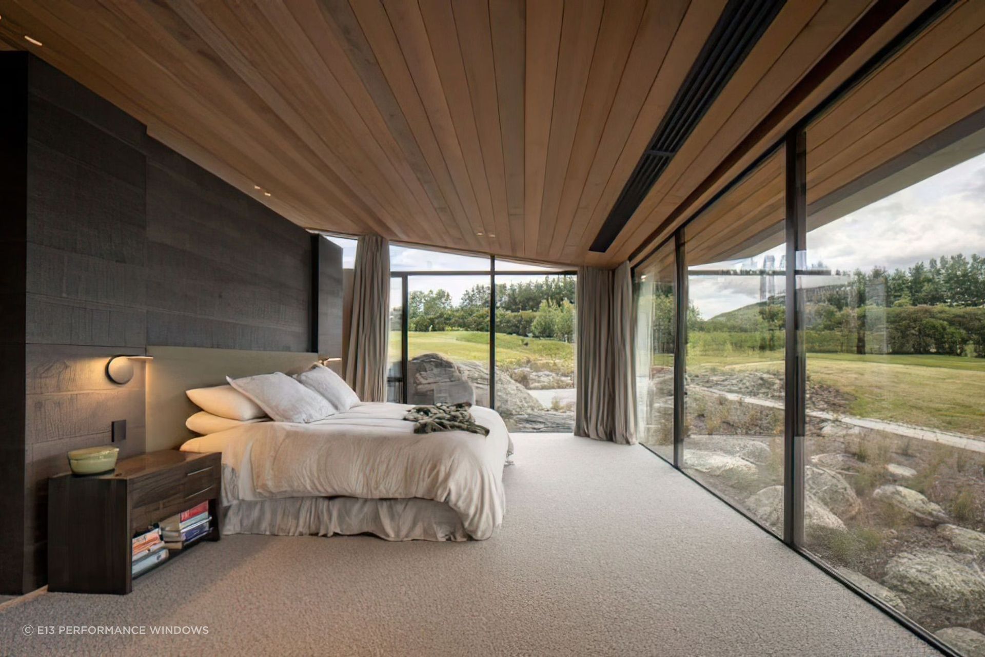 Low-E coatings can reduce heat loss by as much as 50%, providing long term energy savings in homes with a large amount of glazing like this Queenstown property designed by Mason &amp; Wales.
