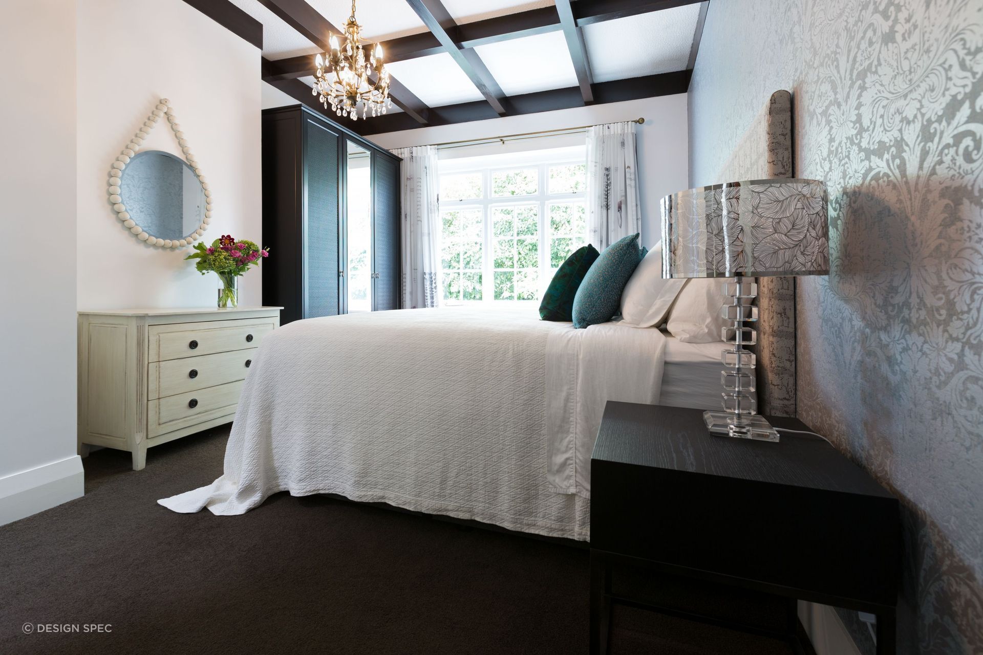 Flowers and greenery can bring a refreshing sense of vitality to a bedroom, seen here in this wonderful example in the Pukenui Road Project.