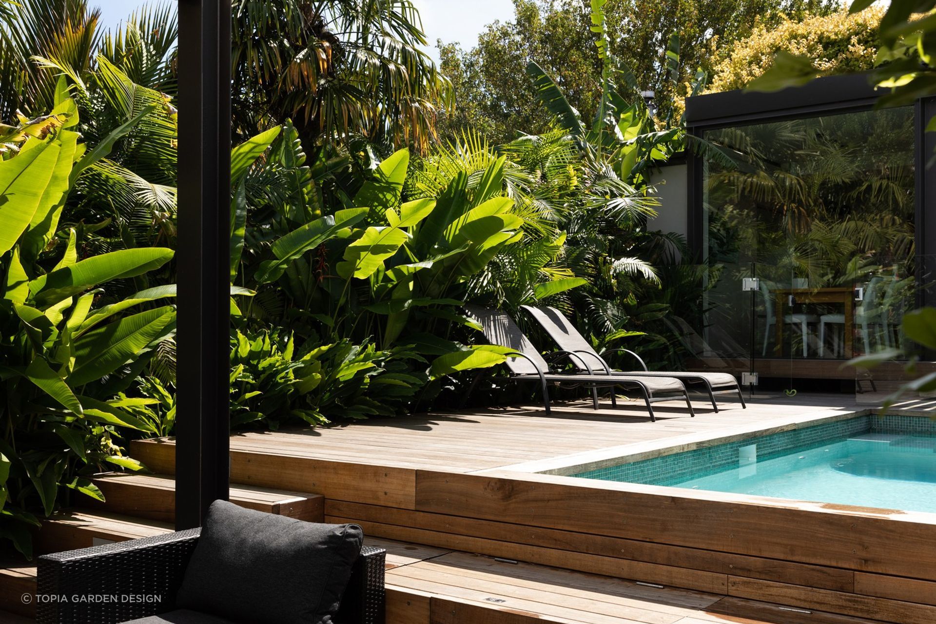 Picking plants that will prosper in your climate is fundamental to success, seen here in this stylish outdoor space in sub-tropical Auckland.