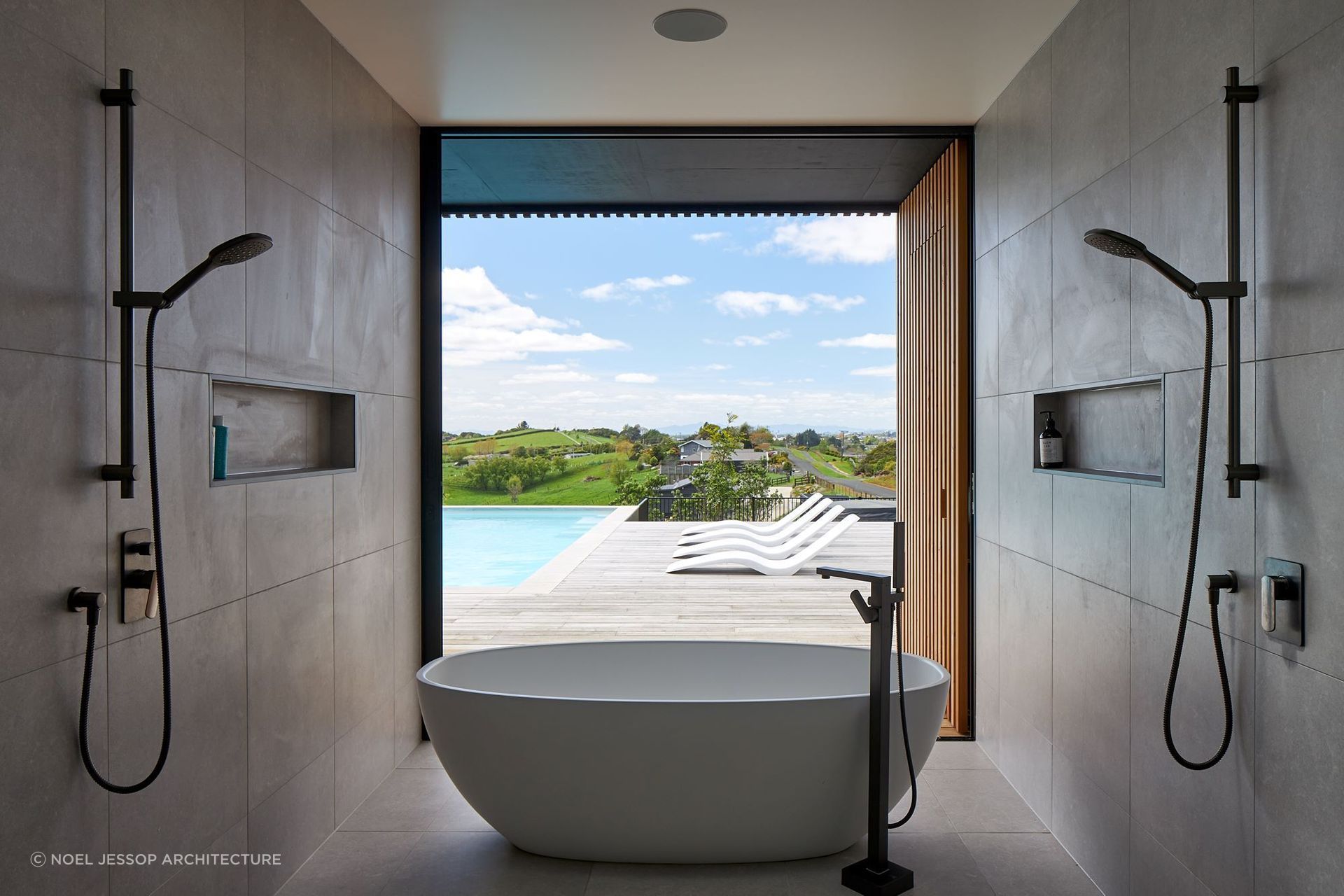 The showers help frame the beautiful view at the S&amp;P House on the outskirts of Hamilton — Photography: Simon Wilson