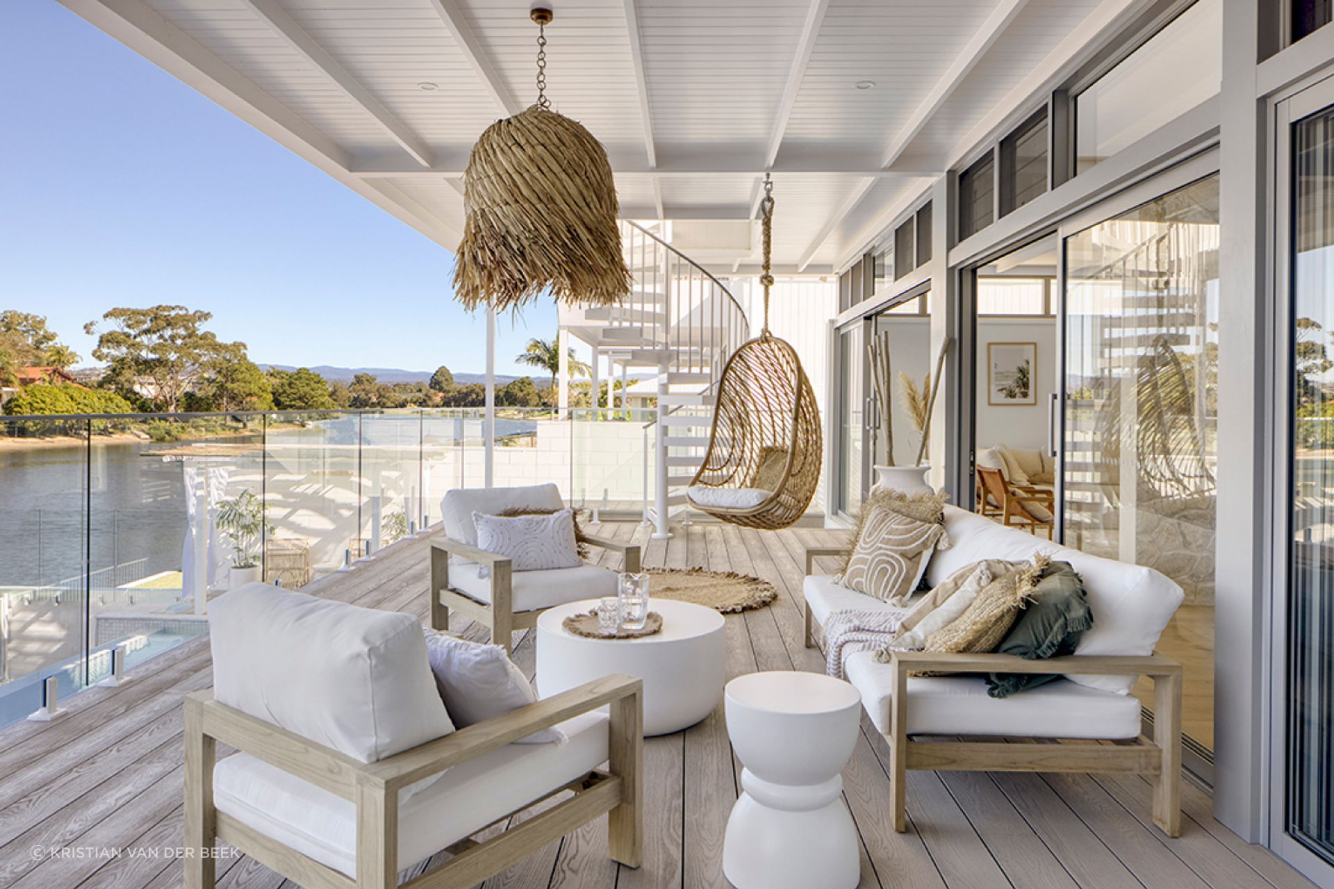 "Selamanya House can be found on the beautiful Burleigh canals, only minutes from Burleigh Beach in the Gold Coast QLD. A simple material palette of weatherboards, stone, timber screens, and large glazing panels all create a luxury coastal feel."