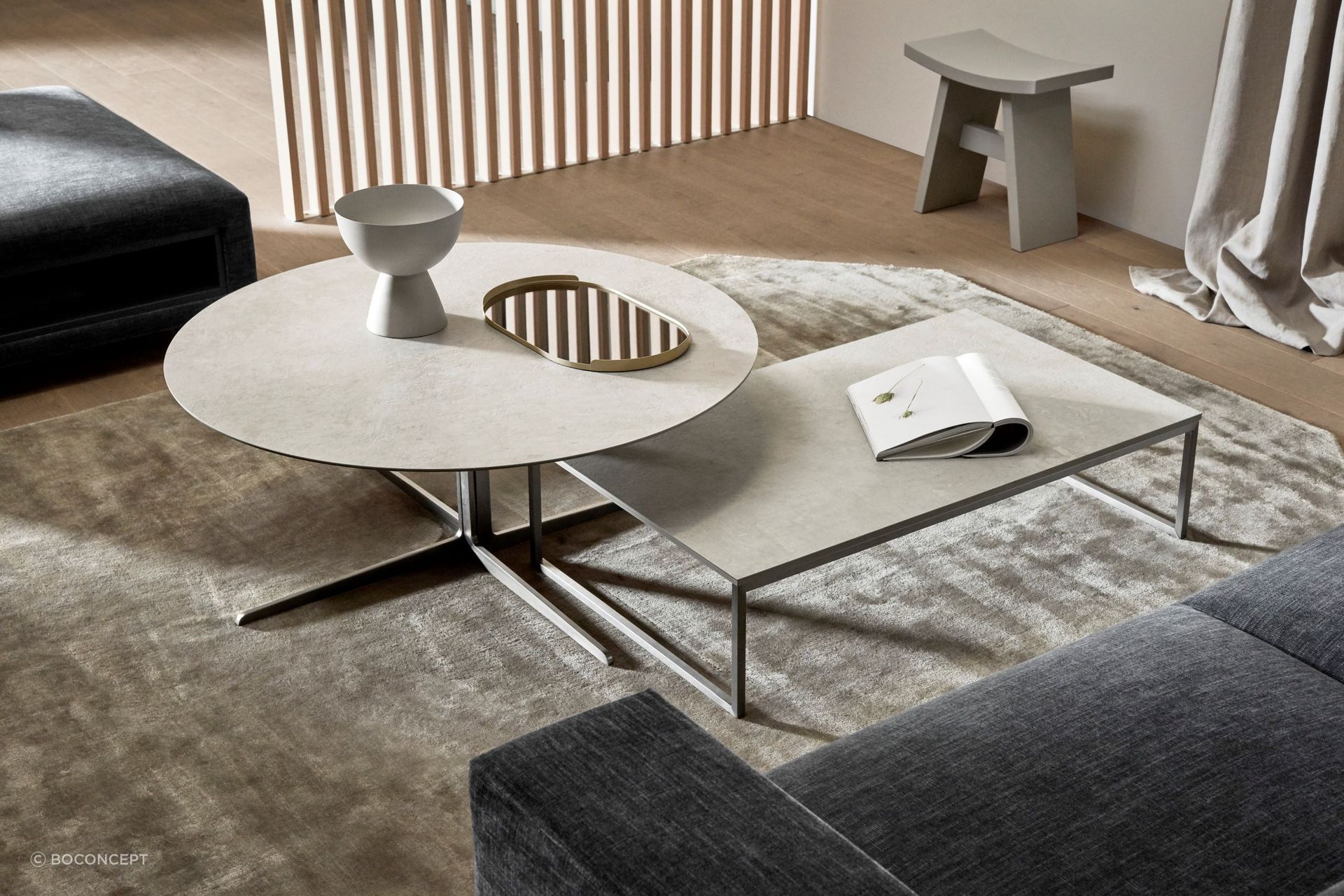 A mirrored surface can be used as a strategic surface to reflect an ornament or architectural feature of the room.