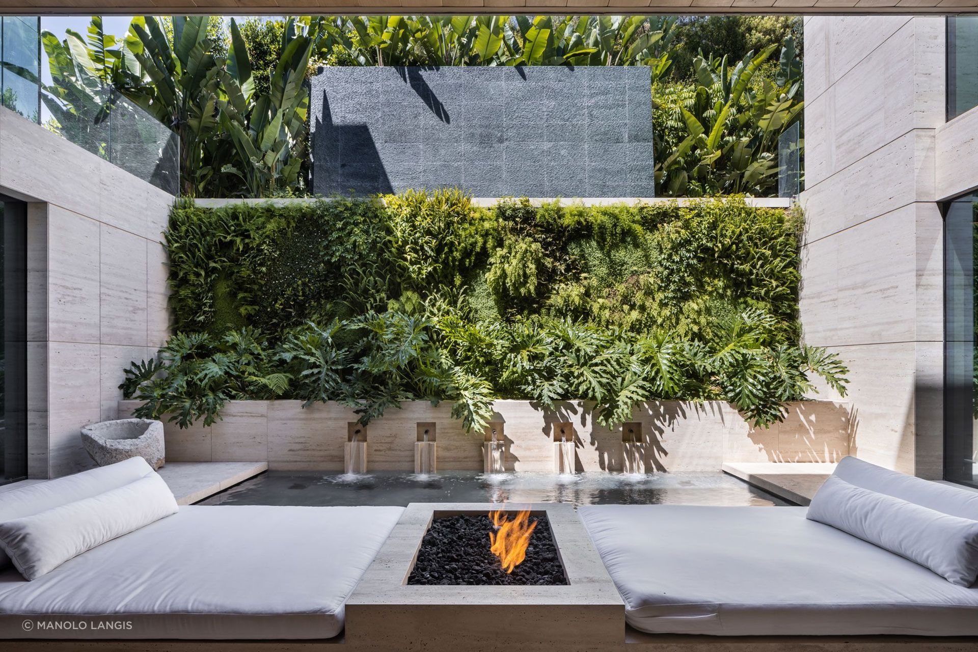 Rather than treating the basement as secondary, McClean Design introduced a planted courtyard at Aria to draw natural light, air and atmosphere into the lower level.