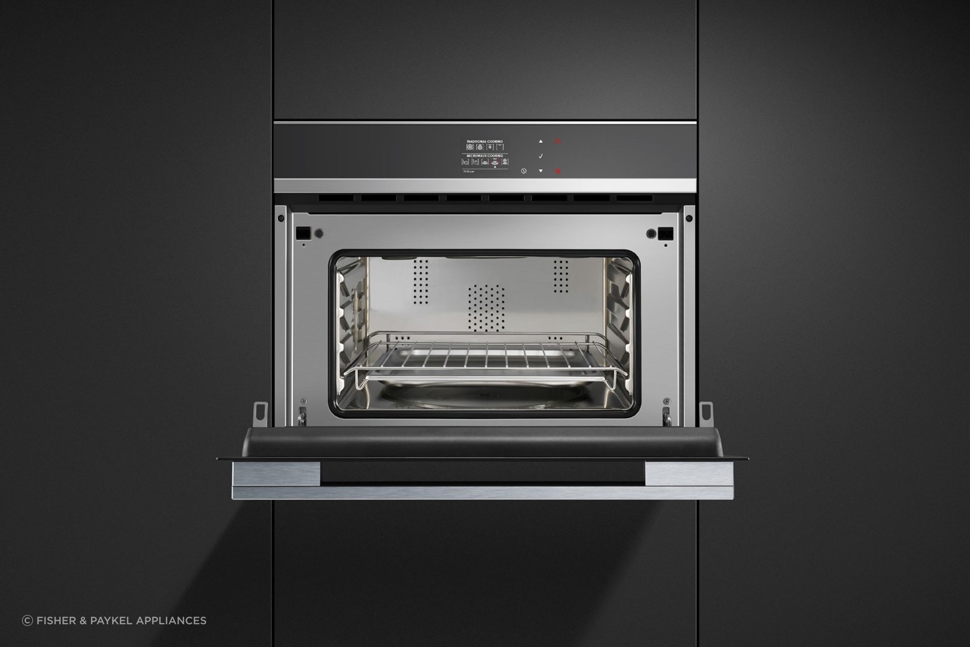Smaller than a conventional oven meaning there is less to clean — the Stainless Steel Combination Microwave Oven from Fisher & Paykel.