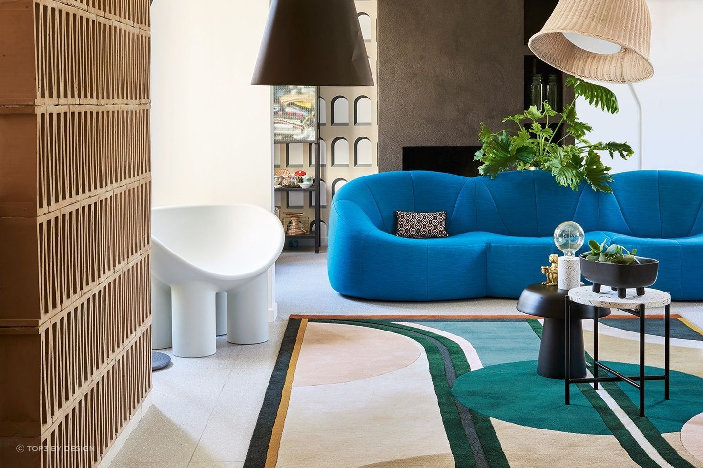 The Sonia Rug by top3 by design features a stunning multi-color palette that effortlessly brings the room together