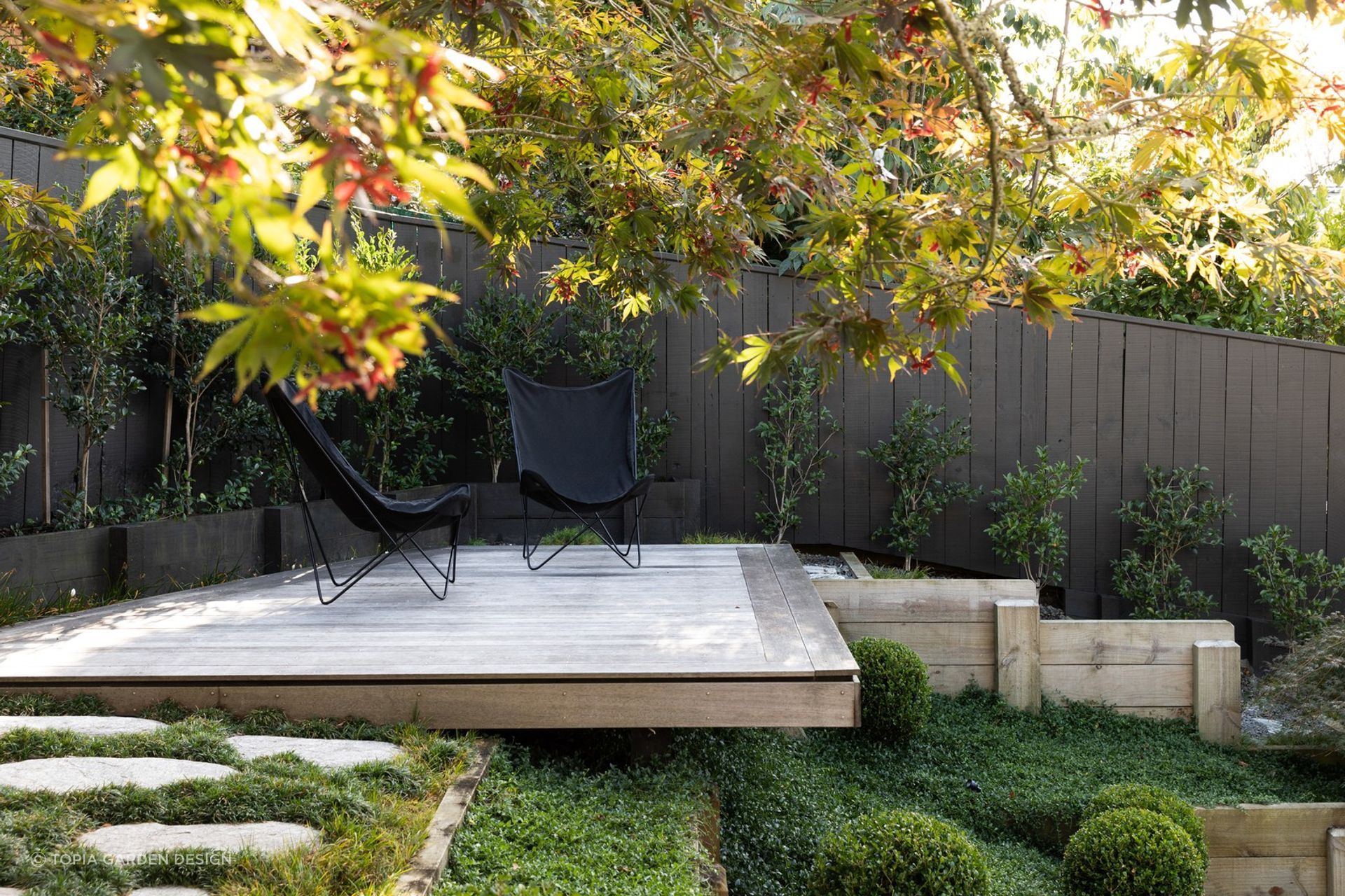 A secluded spot in a corner of a Japanese inspired garden in Crocus Place.