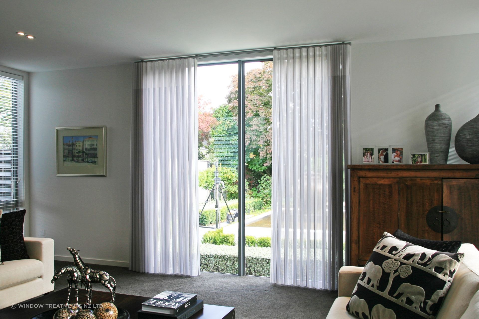 Curtains or blinds or something that's both, like the innovative Mystique Curtain/Blind.
