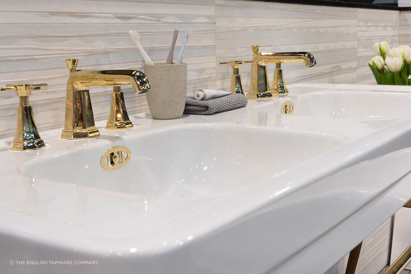 A console sink like the Soho 1300 Double Basin
by The English Tapware Company, brings vintage flair to a space.