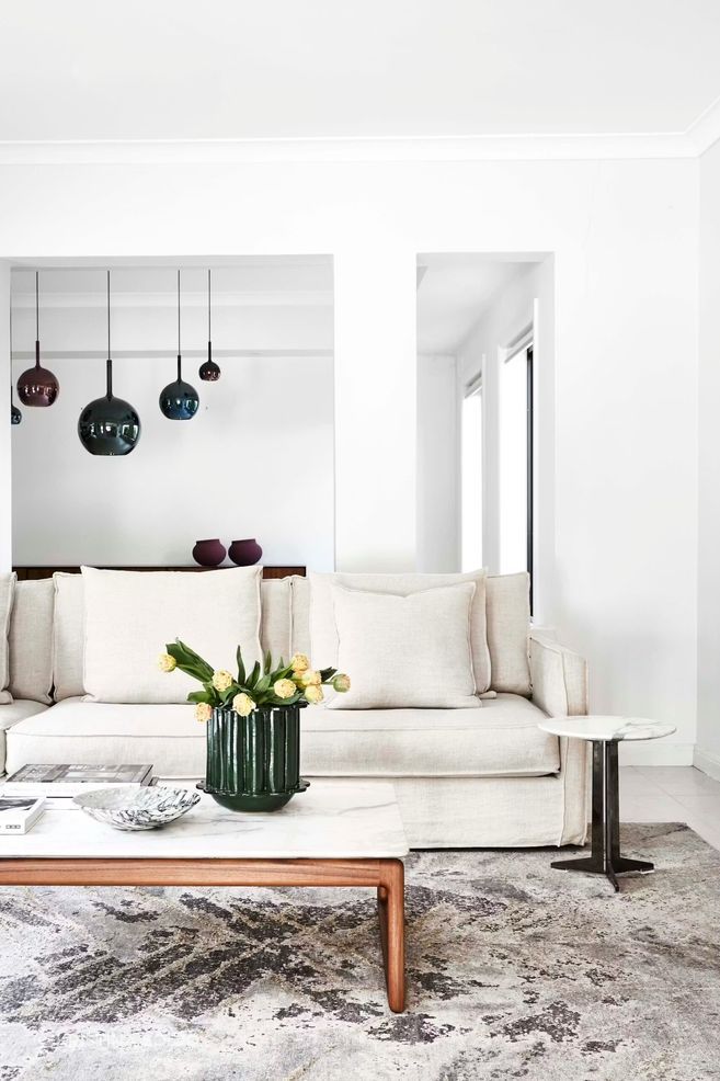 In the living area, the Shore sofa is from Fanuli’s Made in Australia range. Seraphina rug, Flexform ‘Brig’ coffee table and ‘Fly’ side table, all from Fanuli.