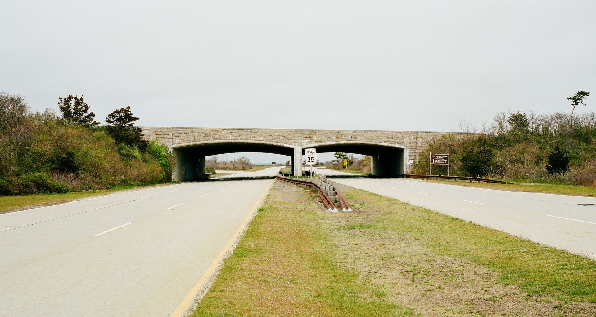 Intentionally low bridges design by Robert Moses and built in 1929 were used to reduce access by city buses, and certain demographics. Photo by Chris Mottalini.