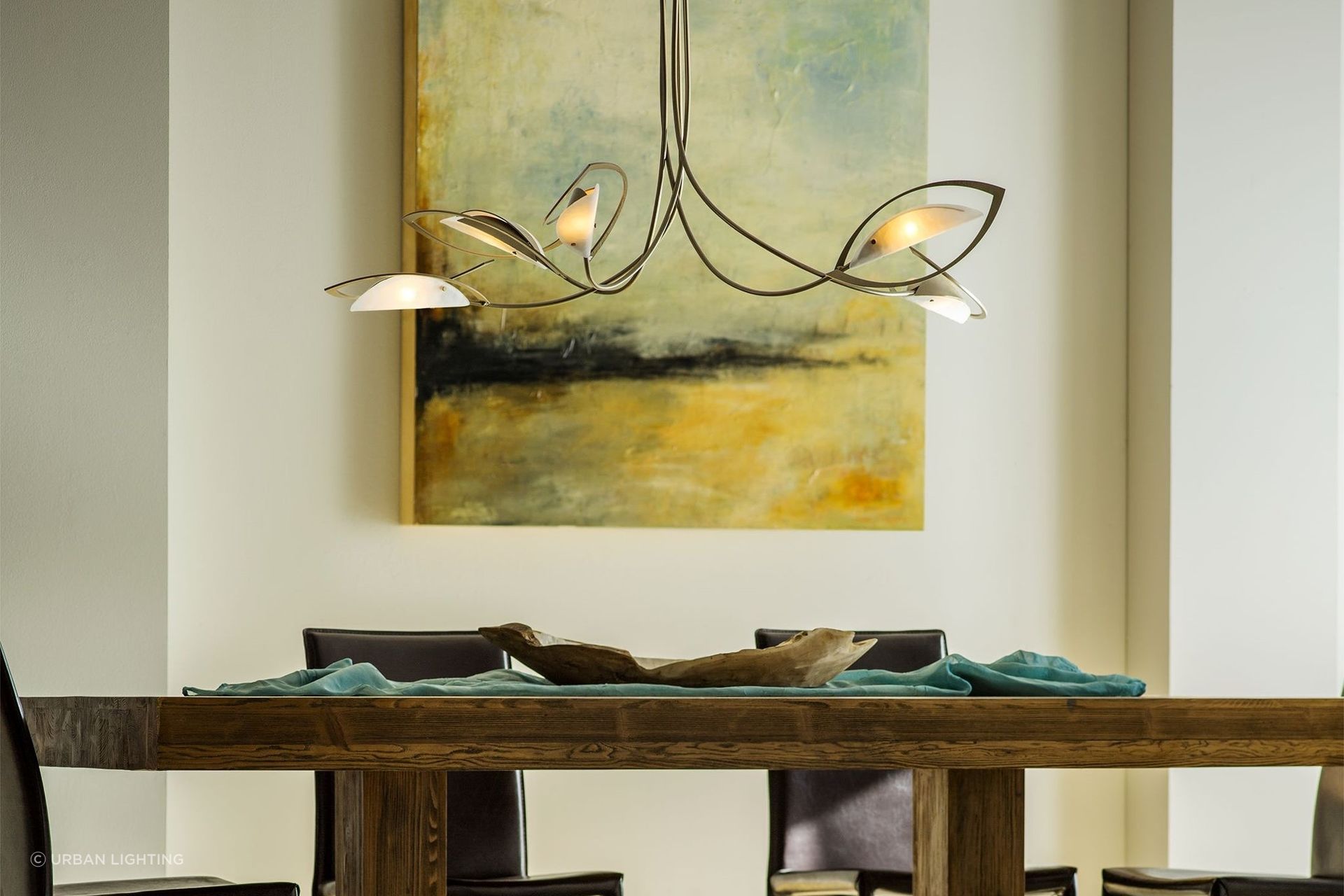 The Aerial Pendant is a sleek and luxurious example of lighting that strikes an artistic balance of materials and style