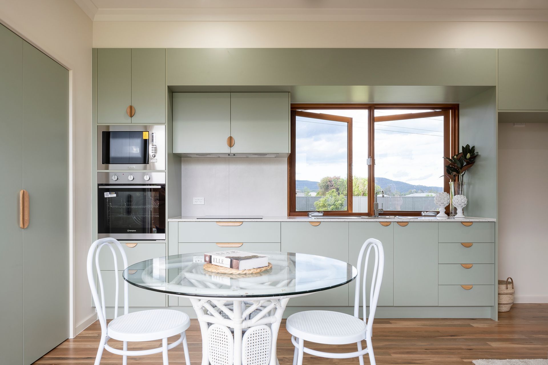 Wide doors, ambulant rails, lever handles, and ideal heights for appliances are some of the ageing-in-place features in this home | Auntie's Hut by 4305 Design | Photography by Angus Martin
