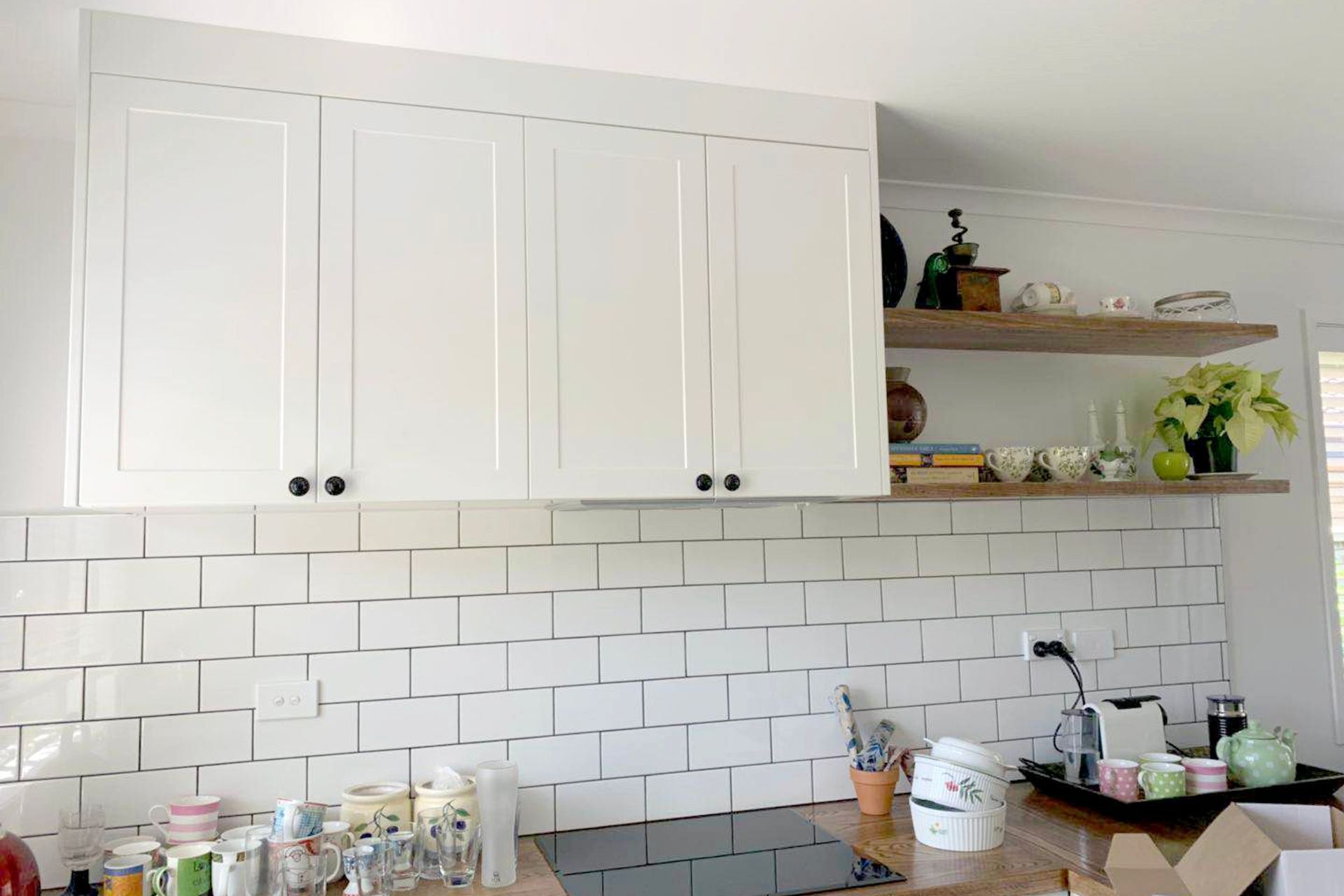 Custom built MDF cabinets which were wrapped and destressed to give a Vintage look — Kitchen renovation in Mangere Bridge
