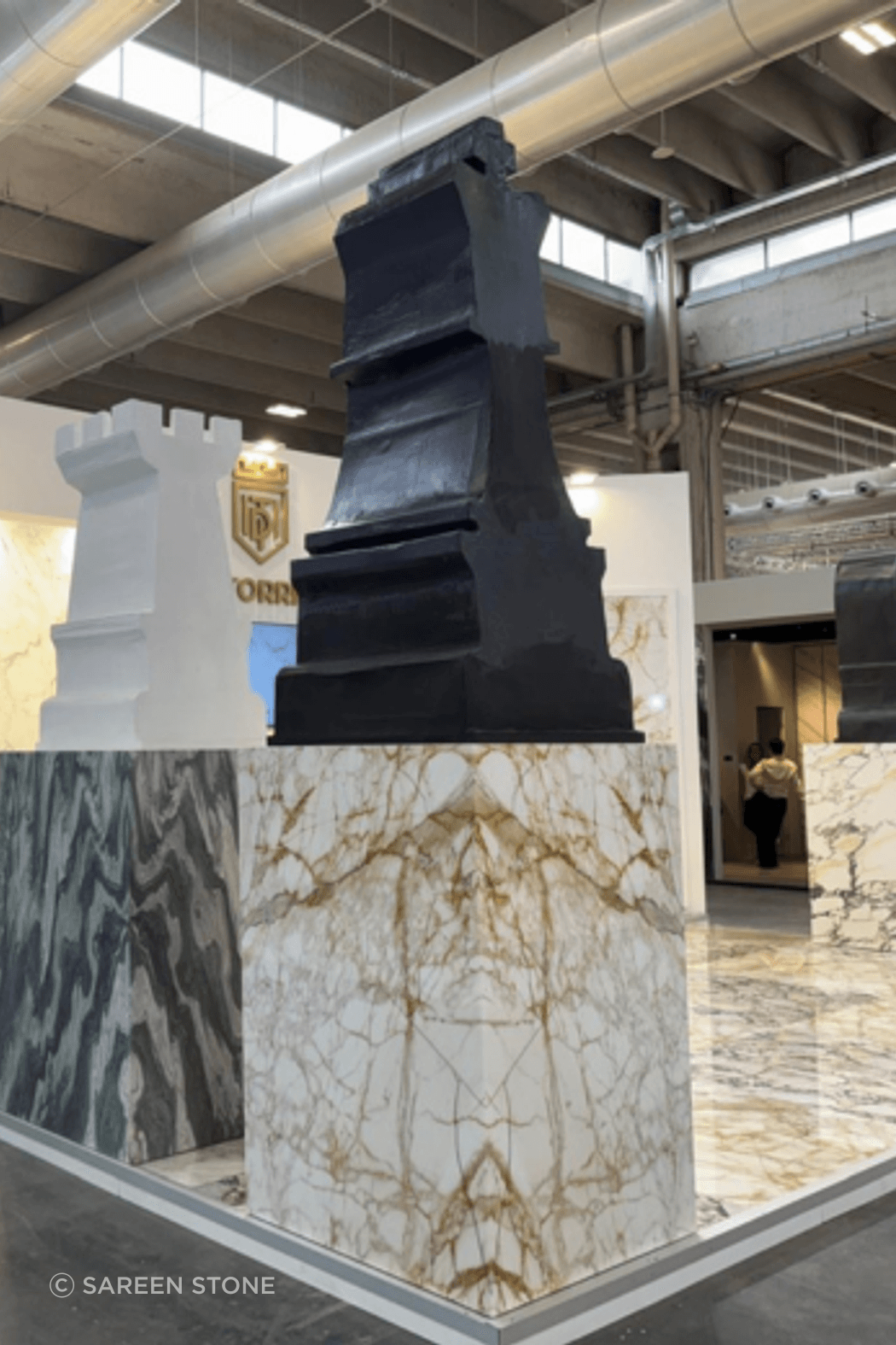 Bold statements in marble. This Marmomac booth highlights the drama of large-format slabs and book-matched panels, from striking grey veining to warm tobacco tones. It's about showing stone at scale, the way it will actually live in a project.