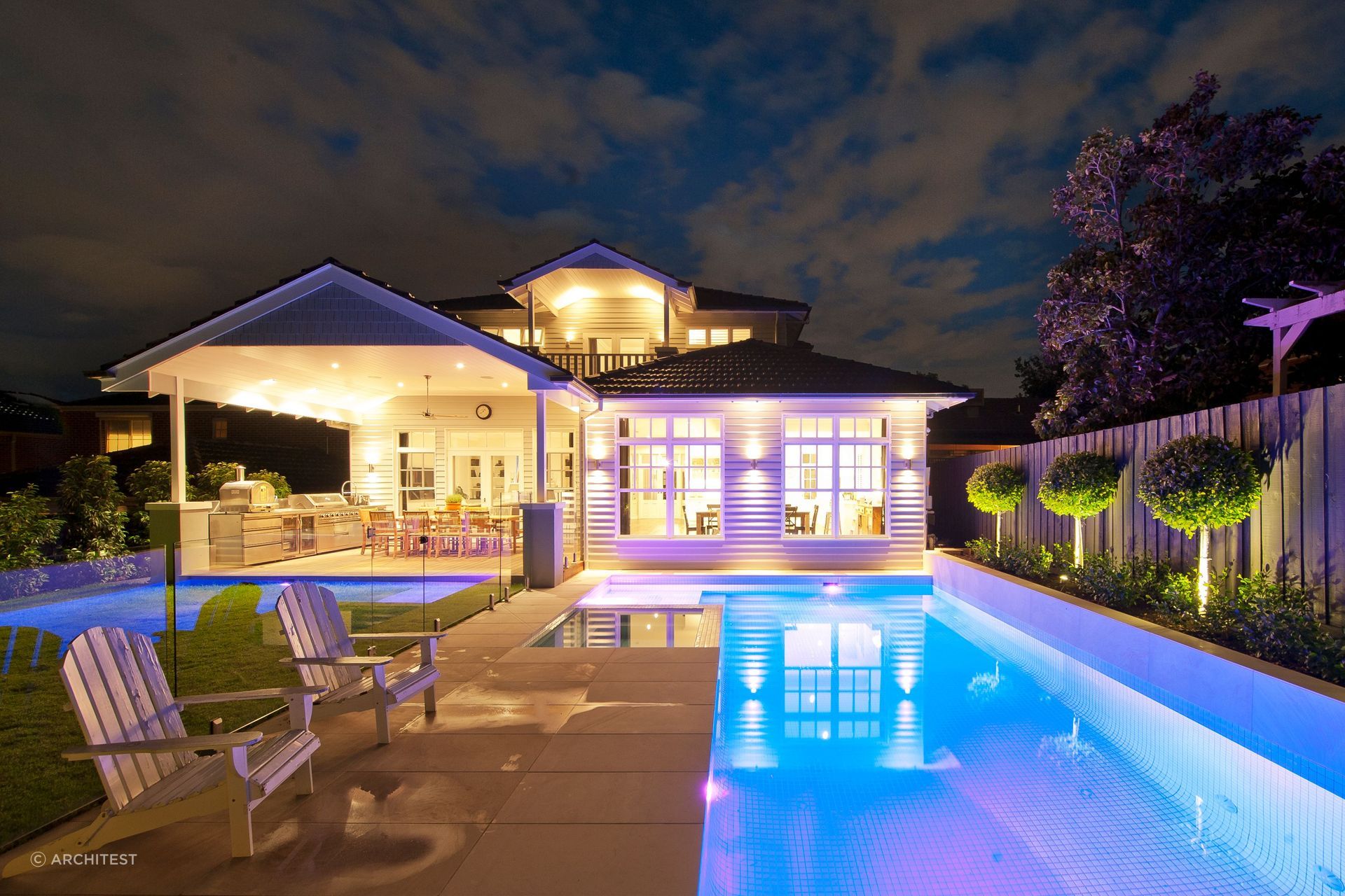 You can have a lot of fun injecting some colour into your pool lighting as you can see in this Californian Bungalow in Balwyn