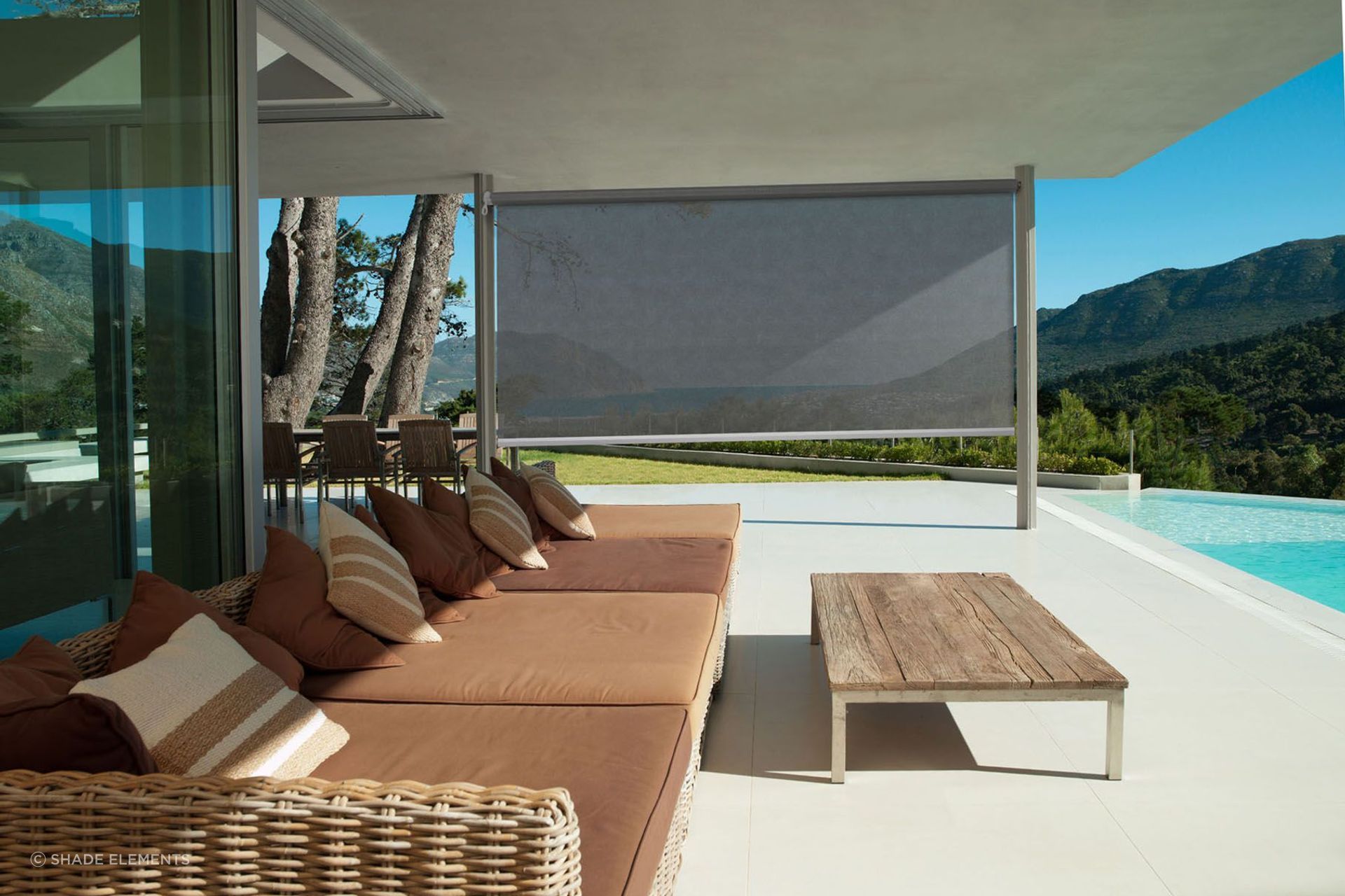 Outdoor blinds like the sleek Omni Screen provide privacy and protection where you need it most.