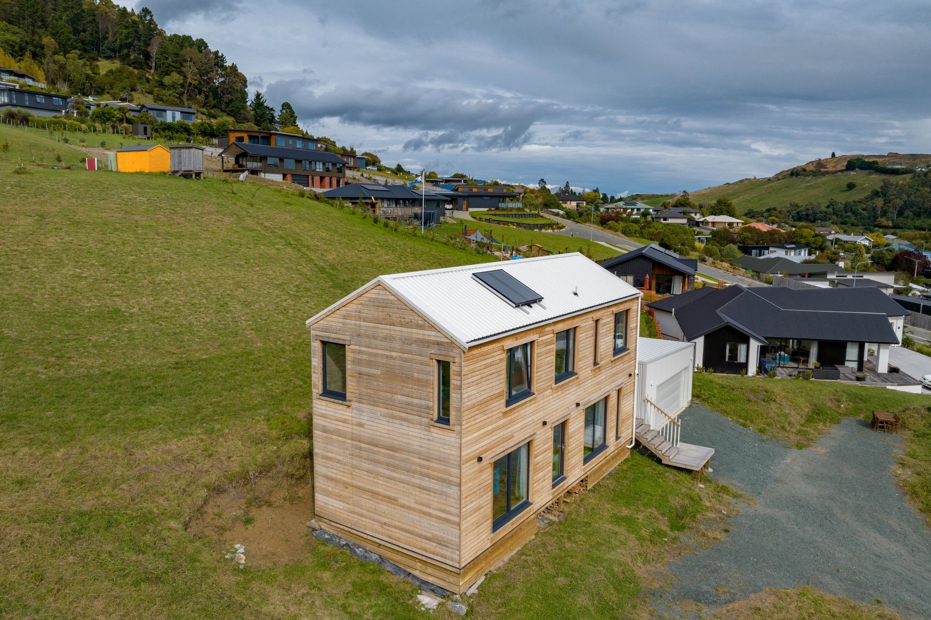 The skillion roof allows for added height in the upstairs bedrooms, creating the illusion of space in spite of the small footprint.