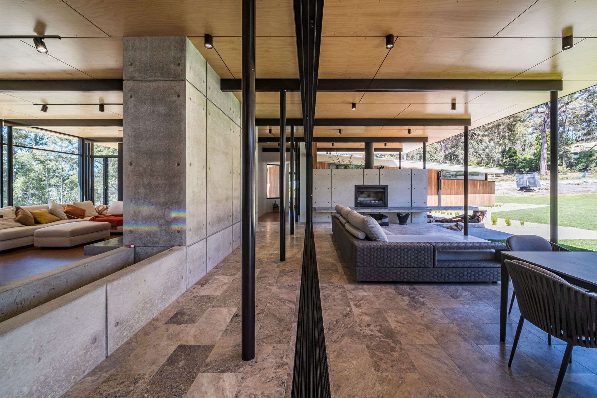The open living area forms the connection between the north and south wings of the home.