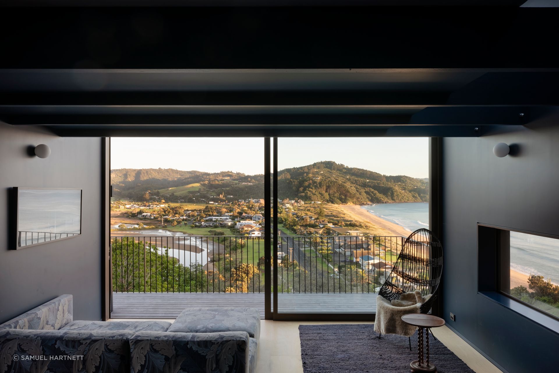 Although the house is 87sqm it can accommodate guests. “There are so many different spaces,” says homeowner and interior designer Natalie Parke. The sofa is from Simon James and the hanging chair is by John Crichton.