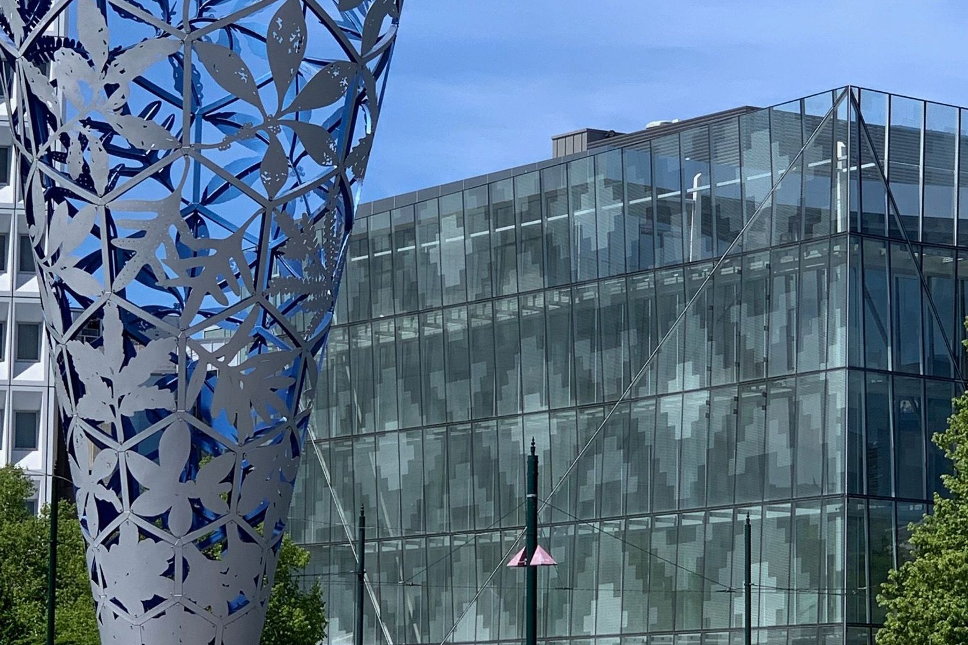 The transparent and open nature of the building creates a better connection between the Square and the retail and hospitality areas. Courtesy of Sheppard &amp; Rout Architects.
