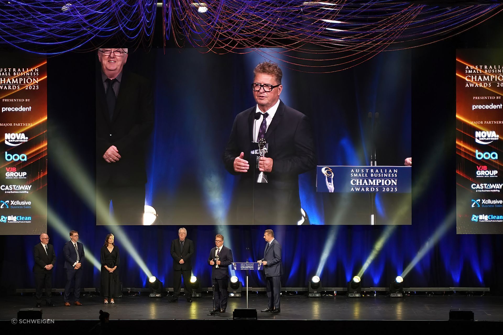Schweigen Co-Owner, Anthony Fletcher, accepts the Specialised Retail Champion Award.